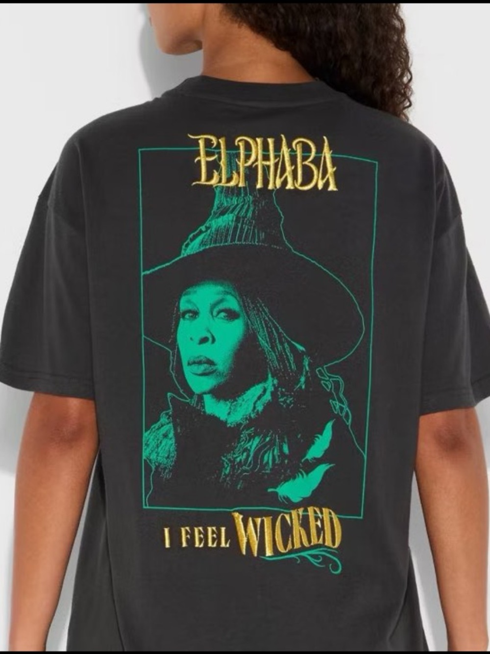 Elphaba 'I Feel Wicked' Embroidered Graphic Tee - Black with Green & Gold Print